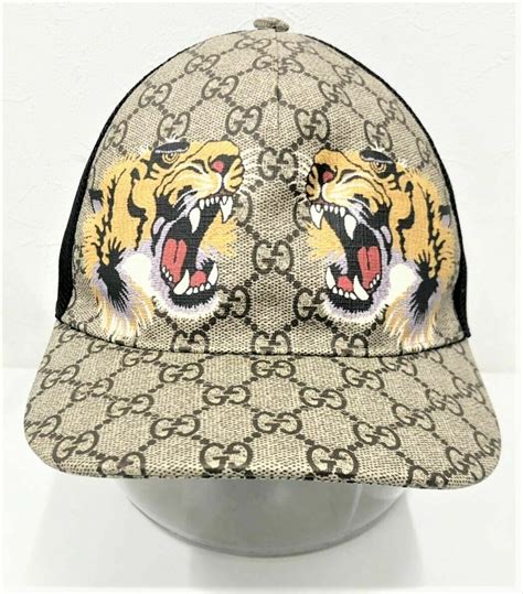 black gucci tiger hat|Gucci tiger print bucket hat.